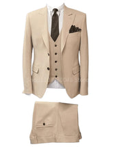 A three-piece khaki suit featuring a slim-fit blazer with peak lapels, a vest, and matching trousers.