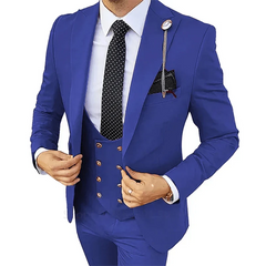 A man wears a slim-fit royal blue three-piece suit with a white shirt and a polka-dot tie.