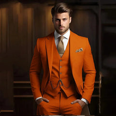 A man wears a slim-fit, three-piece orange suit with a matching vest and a textured gold tie.