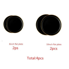 A set of four round black ceramic dinner plates with gold rims, including two 8-inch and two 10-inch plates.