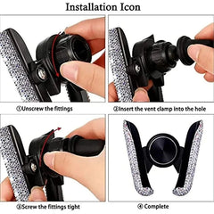 A rhinestone-encrusted car phone holder with an air vent mount and installation instructions.