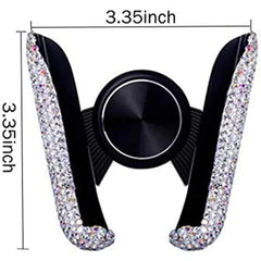 A rhinestone-encrusted car air vent phone holder measuring 3.35 inches square.