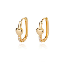 A pair of gold-colored stainless steel hoop earrings featuring a small heart and zircon accents.