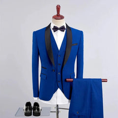 A royal blue three-piece suit with a black shawl collar, vest, and matching trousers.