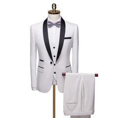 A white three-piece tuxedo suit with a black shawl collar and a light grey bow tie.