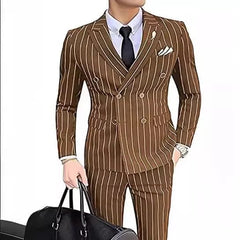 A man wears a brown double-breasted suit with white vertical stripes and a black tie.