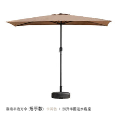 A tan half-square outdoor umbrella with a hand-crank mechanism and a semi-circular water base.