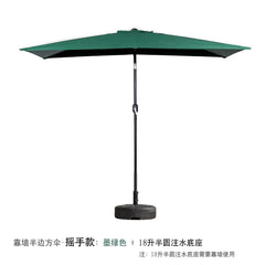 A dark green half-square outdoor umbrella with a hand-crank mechanism and a semi-circular base.