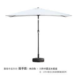 A white half-umbrella with a hand-crank mechanism and a black semi-circular water-filled base.
