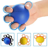 A hand holds a blue spherical grip strengthener with finger loops, shown in various color options.
