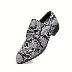 A gray and black snake-patterned oxford shoe with a pointed toe and lace-up closure.