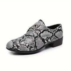 Gray and black snake-patterned lace-up oxford shoes with a low block heel and pointed toe.