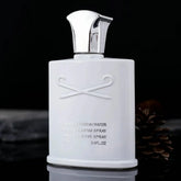 A white 100ml perfume bottle with a silver cap and the text Silver Mountain Water on the front.