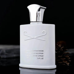 A white 100ml perfume bottle with a silver cap and the text Silver Mountain Water on the front.