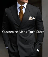 A man wears a black double-breasted suit with a peaked lapel, white shirt, and brown tie.