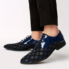 A pair of men's low-top lace-up shoes featuring a blue patent leather tongue and a geometric patterned body.