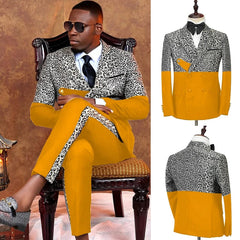 A man wears a mustard yellow and leopard print double-breasted suit with matching trousers.