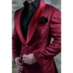 A slim-fit burgundy jacquard blazer for men featuring a satin shawl lapel and a single button.