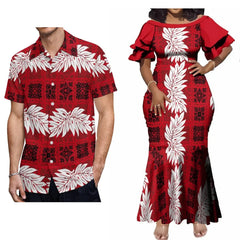 A man and woman wearing matching red outfits with white leaf and black geometric patterns.