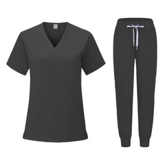 A dark gray women's scrub set featuring a V-neck top and matching jogger-style pants.
