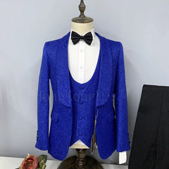 A royal blue three-piece suit with a patterned fabric and a black shawl lapel on a mannequin.