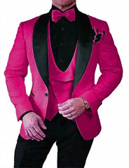 A hot pink patterned tuxedo jacket with a black shawl lapel, matching vest, and black trousers.