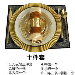 A luxury ten-piece Western tableware set featuring gold-rimmed plates, cutlery, a placemat, and a napkin with a gold ring.