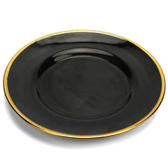 A round black bone china dinner plate featuring a thin gold rim.