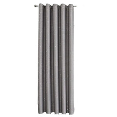 A grey blackout curtain panel with a star pattern and silver grommet top.