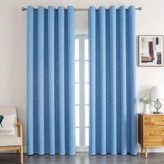 Light blue blackout curtains with a silver star pattern and grommet top for window hanging.