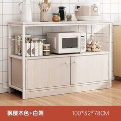A three-tier kitchen storage cabinet with a white metal frame and light wood-grain shelves.