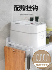 A white wall-mounted kitchen storage rack holds a rice cooker and includes four detachable hooks.