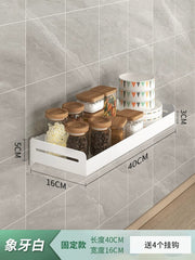 A white wall-mounted rectangular storage rack holds various glass jars and bowls against a tiled wall.