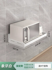 A white wall-mounted kitchen rack holds a microwave and toaster against a tiled wall.