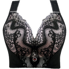 A black lace push-up bra with wide straps and a decorative charm at the center.