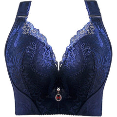 A dark blue lace push-up bra with wide straps and a decorative charm at the center.