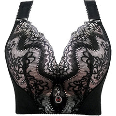 A black lace push-up bra with a decorative charm at the center gore.