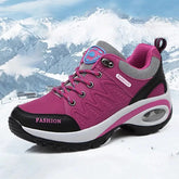 A magenta and black lace-up sneaker with a thick white platform sole and a visible air cushion.