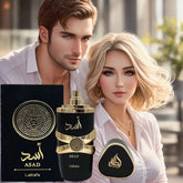 A bottle of Lattafa Asad perfume stands in front of a man and woman in a professional setting.