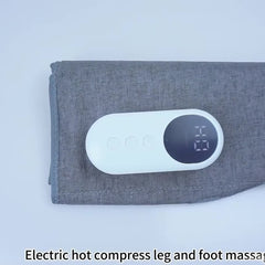 A grey fabric leg massager with a white digital control panel featuring three buttons.