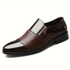 A brown pointed-toe men's loafer with a side zipper, perforated leather panel, and glossy finish.