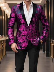 A man wears a magenta and black paisley patterned blazer with a black lapel and one button.