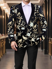 A man wears a black single-breasted blazer featuring a gold and light blue floral bird pattern.