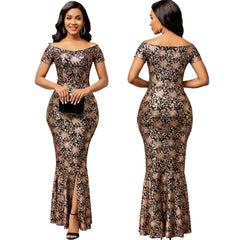 A woman models a black and gold floral off-the-shoulder maxi dress with a front slit.