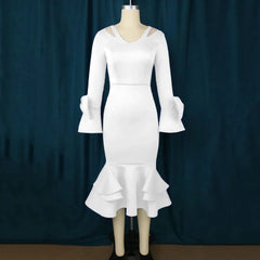 A white midi-length mermaid dress featuring a V-neck, cold-shoulder cutouts, and flared sleeves.