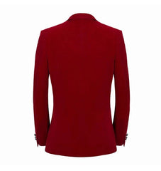 A red velvet men's suit jacket with a peak collar and single-button closure, shown from the back.