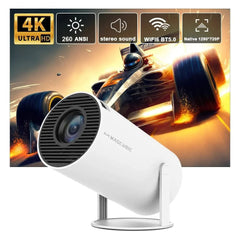 A white Magcubic portable projector on a stand against a background showing a race car.