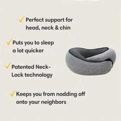 A grey memory foam travel pillow with a wrap-around design for neck and chin support.