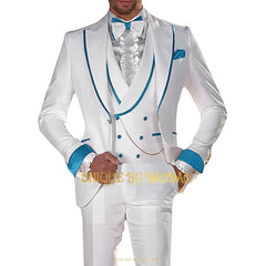 A man wears a white three-piece suit with teal trim on the lapels, cuffs, and vest.