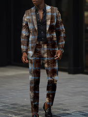 A man wears a slim-fit suit featuring a blue and brown digital plaid print with a black shirt.